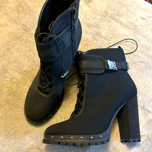 Never worn women’s boots.